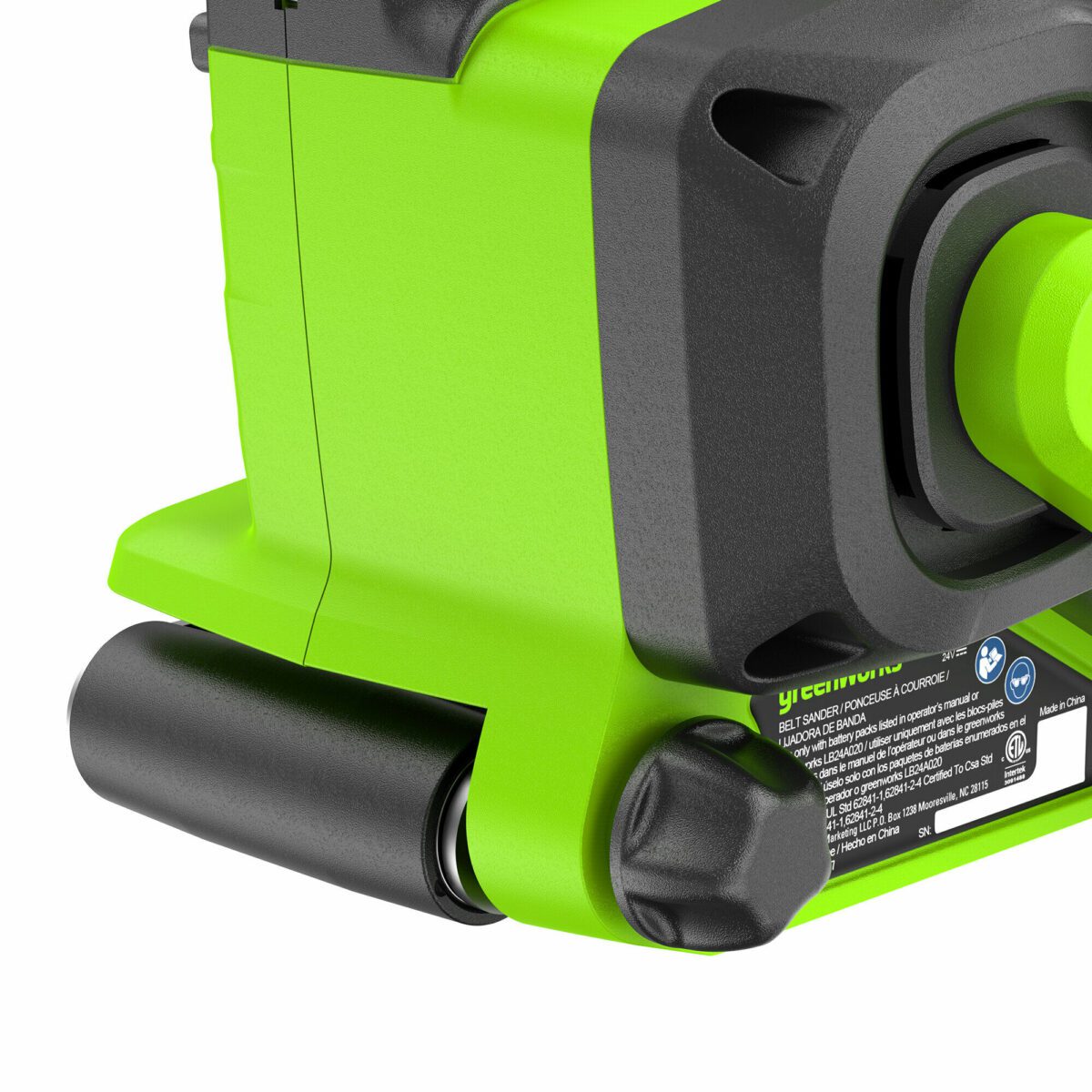 Ленточный шлифовальный станок Greenworks зеленого цвета с черными элементами и эргономичной ручкой