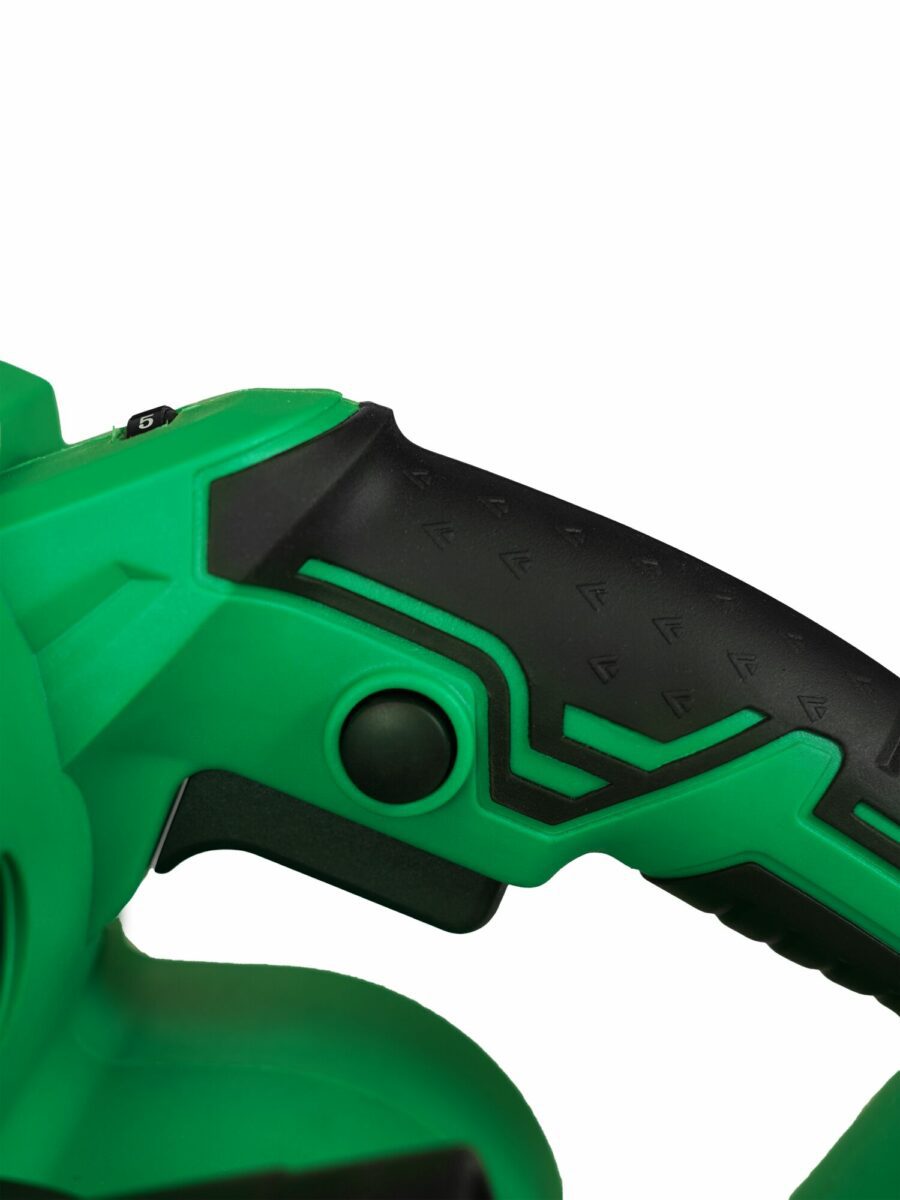 Зеленая ручка с текстурированной поверхностью, черными вставками, кнопкой и переключателем с цифрой «5»