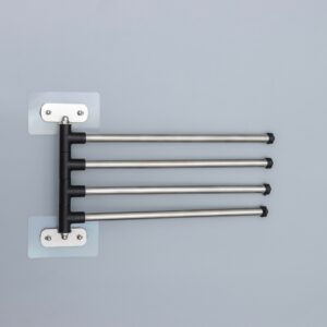 Стильный поворотный держатель для полотенец с четырьмя металлическими спицами на гладкой поверхности стены