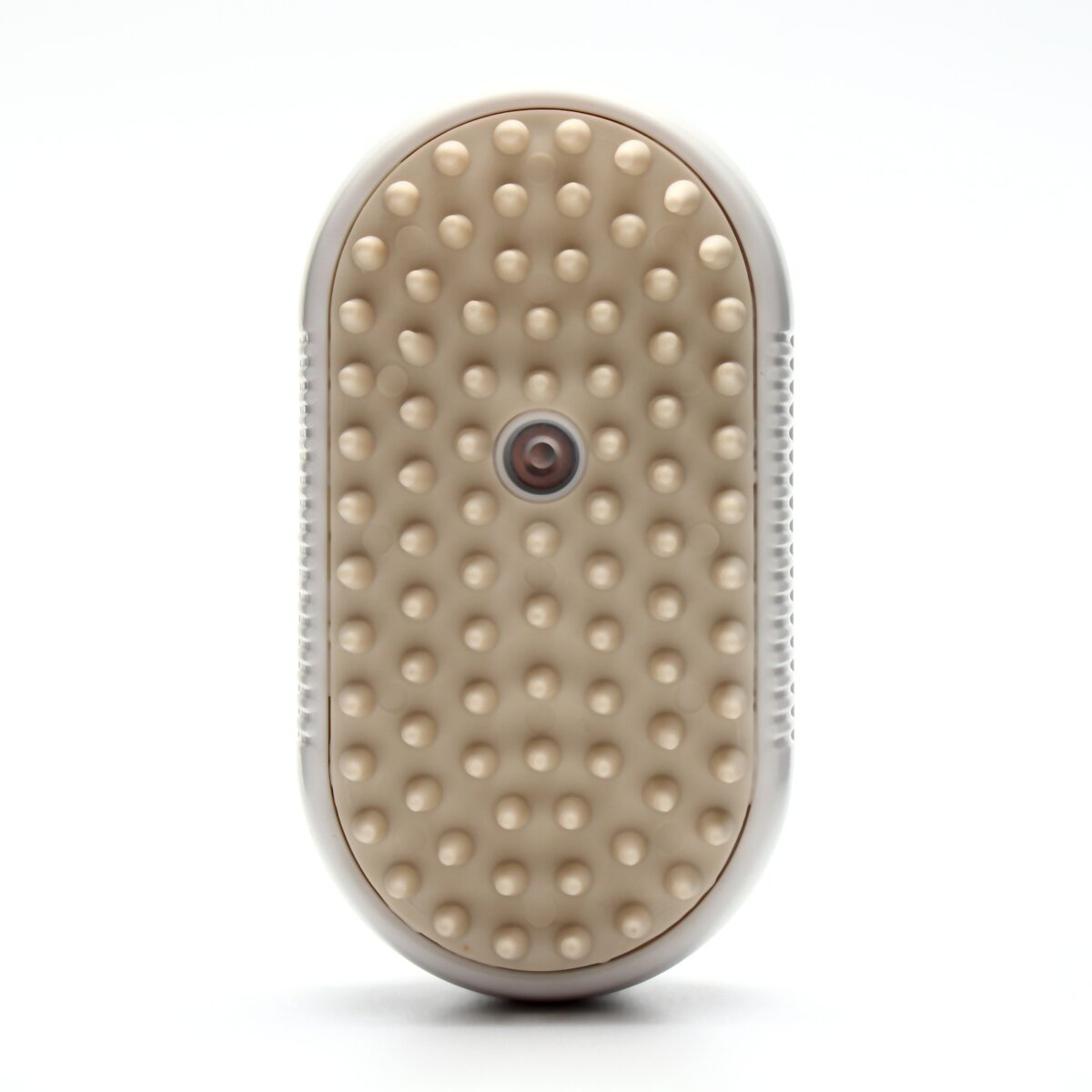 Паровая щетка для животных: уход за шерстью кошек и собак с помощью пара Паровая щетка для животных белого цвета с овальной формой, предназначенная для вычесывания шерсти кошек и собак