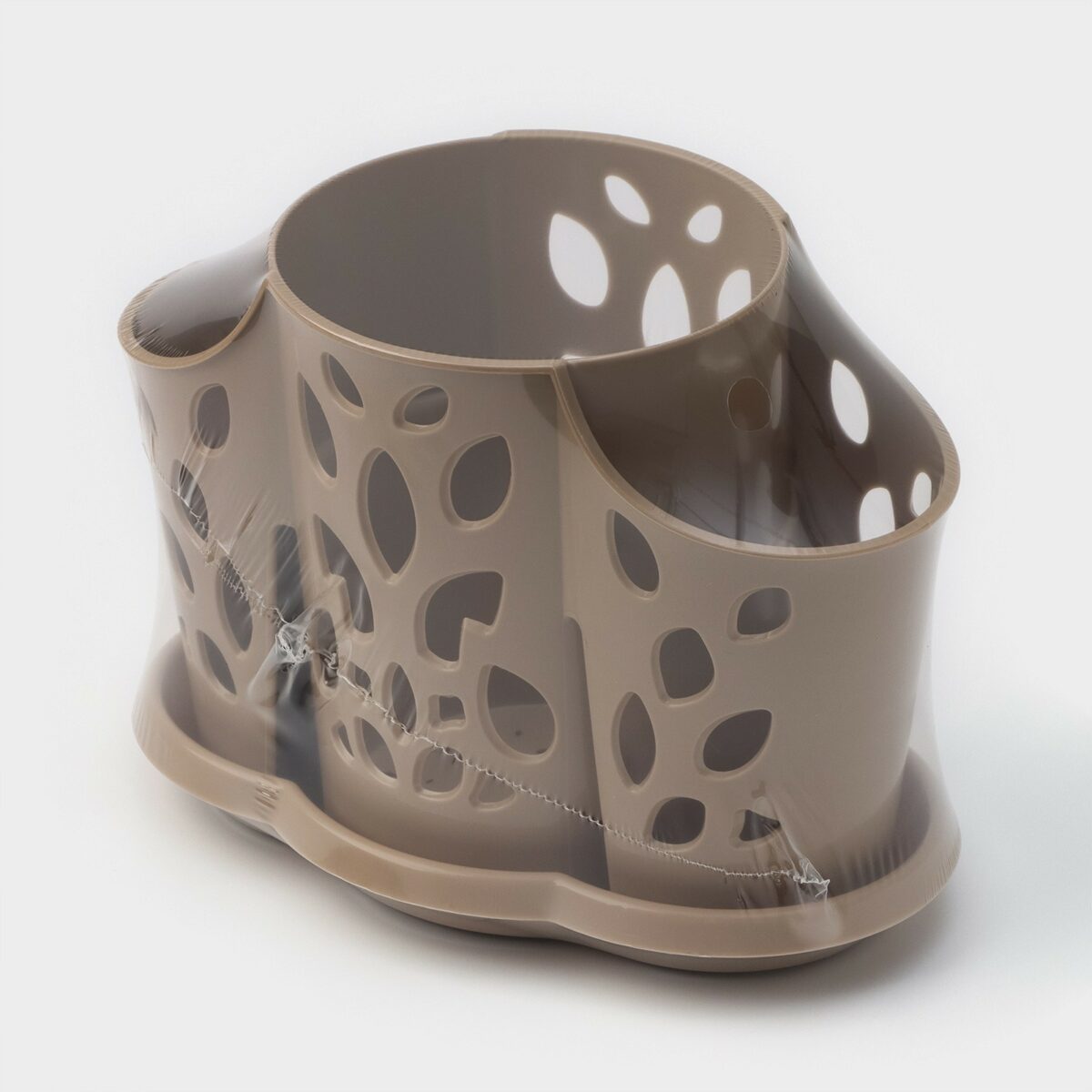 Компактный бежевый органайзер для кухни с ажурным дизайном и тремя секциями Бежевый пластиковый органайзер для кухни с тремя секциями и ажурными вырезами